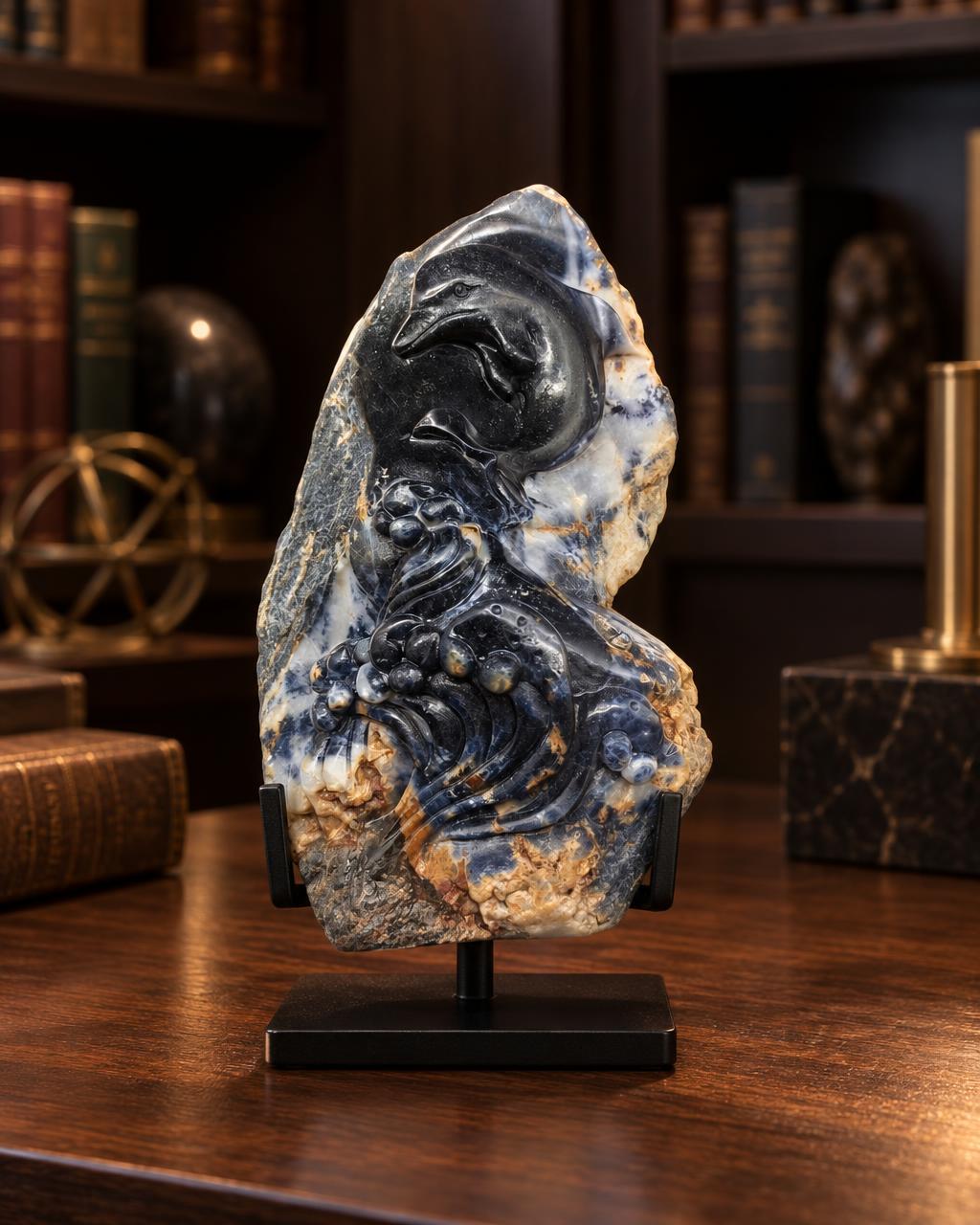 Daniel McKinney - The Dolphin Sapphire tabletop in-room collector visual